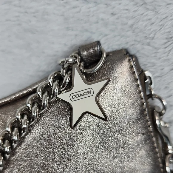 Coach Star Tag Shimmering Silver Wristlet - Picture 2 of 4